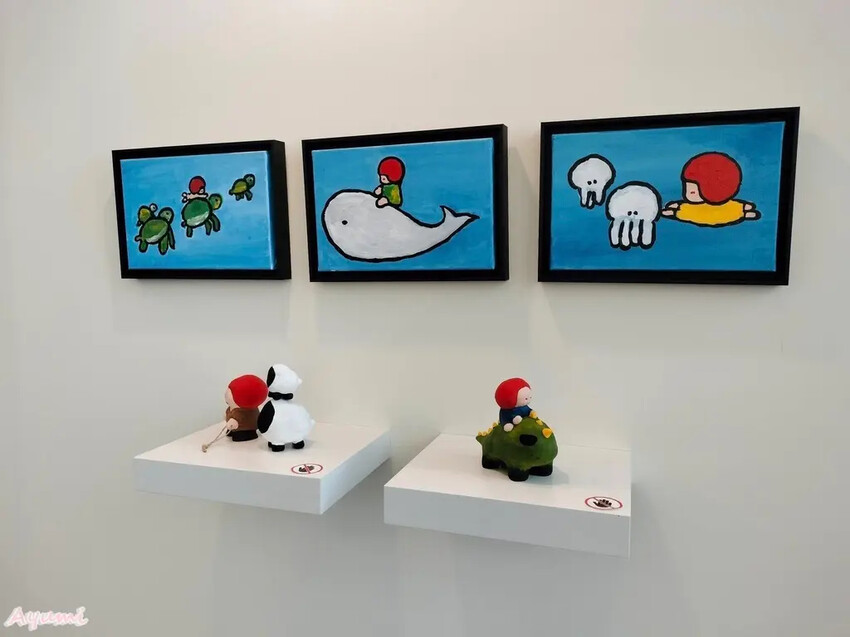 海洋中的一片森林特展藝術家寧芮潔創作的Moi大型氣球裝置爬上