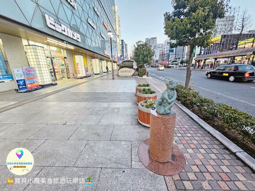 日本[旅遊]岡山 岡山站前商店街 巨型桃子吊飾 商店街的亮眼入口