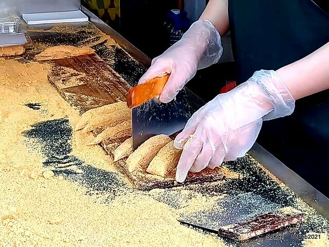 Malt peanut candy booth at Taoyuan ,桃園大溪老街蔡記花生麥芽糖, DaHsi area,Taoyuan city, North Taiwan, Feb 12, 2021. SJKen