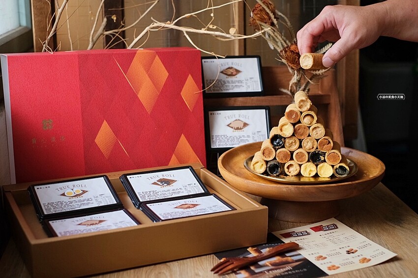 台中超狂爆餡蛋捲伴手禮║有魔性的蛋捲創下月銷10萬捲紀錄!!滿滿的內餡誰能抵擋,四種口味一次滿足,完封零食控的心!