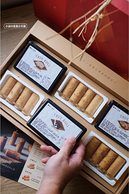 台中超狂爆餡蛋捲伴手禮║有魔性的蛋捲創下月銷10萬捲紀錄!!滿滿的內餡誰能抵擋,四種口味一次滿足,完封零食控的心!