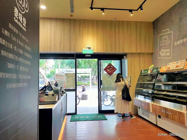 Muffin burger with fish steak and fried egg and Ceylon black tea at Taiwan fastfood store 