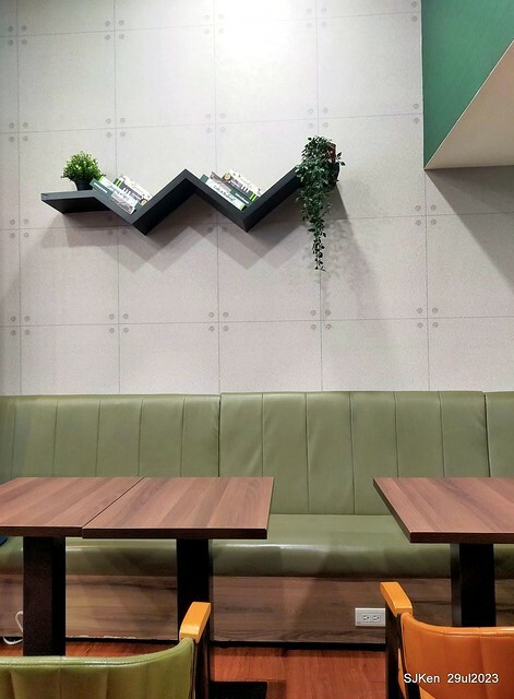 Muffin burger with fish steak and fried egg and Ceylon black tea at Taiwan fastfood store 