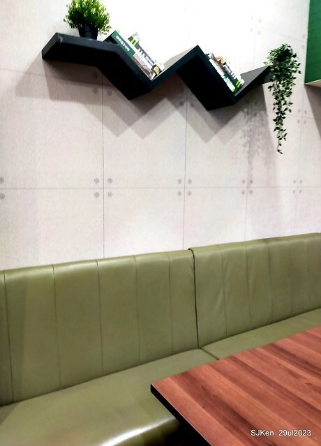 Muffin burger with fish steak and fried egg and Ceylon black tea at Taiwan fastfood store 