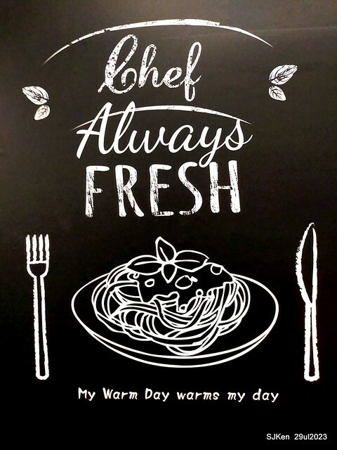 Muffin burger with fish steak and fried egg and Ceylon black tea at Taiwan fastfood store 