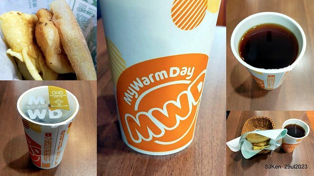 Muffin burger with fish steak and fried egg and Ceylon black tea at Taiwan fastfood store 