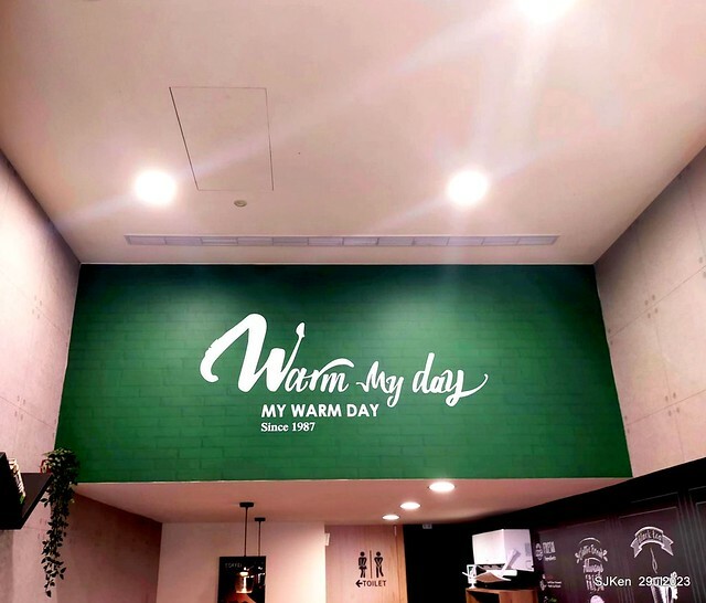 Muffin burger with fish steak and fried egg and Ceylon black tea at Taiwan fastfood store 