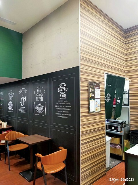 Muffin burger with fish steak and fried egg and Ceylon black tea at Taiwan fastfood store 