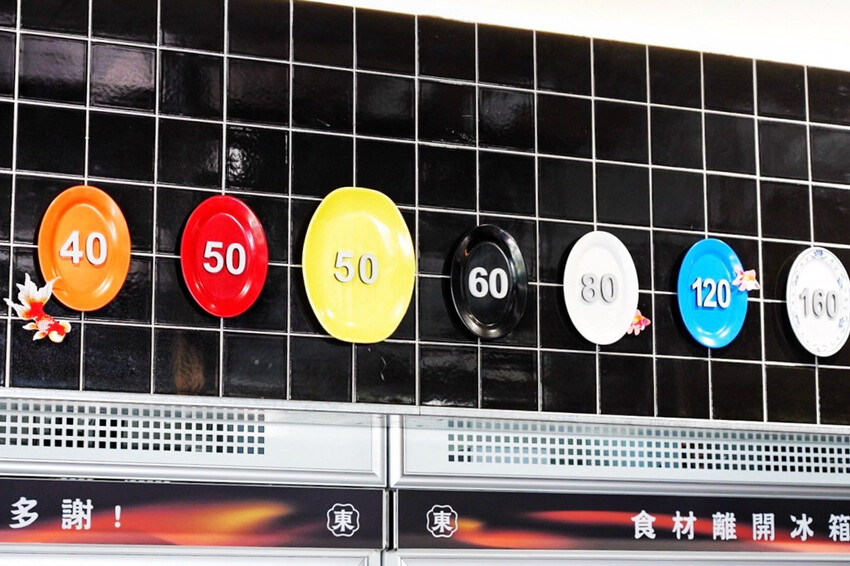 距離華泰名品城3分鐘車程!招牌石頭麻油炒魷魚干、辛香料~現場爆炒香氣好逼人