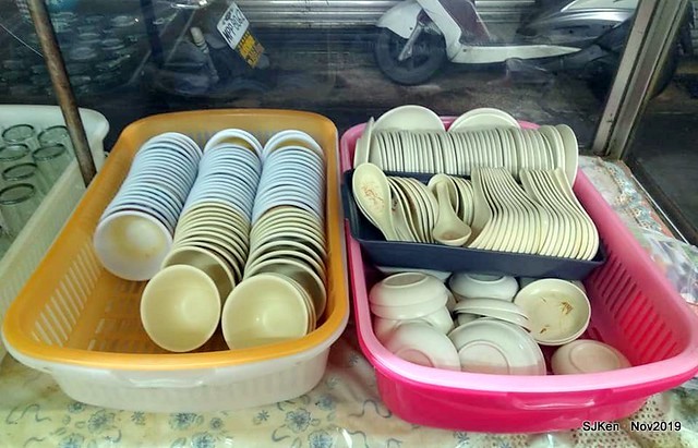 The spicy soup with Chives taste dumpling & seafood fried noodle at the traditional dumpling store ,Taipei, Taiwan, Nov 16, 2019