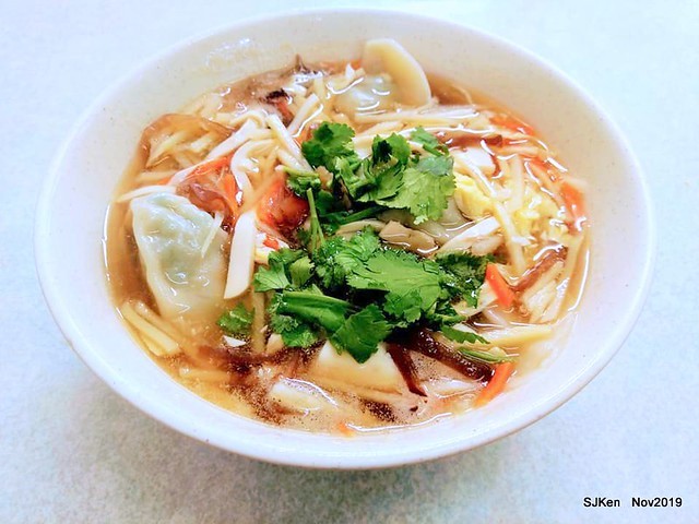The spicy soup with Chives taste dumpling & seafood fried noodle at the traditional dumpling store ,Taipei, Taiwan, Nov 16, 2019