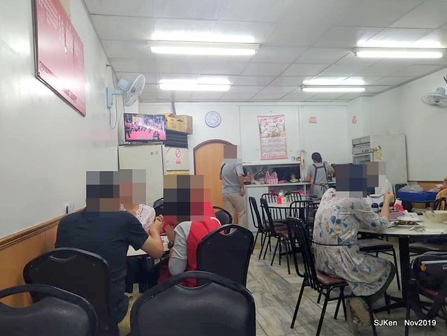 The spicy soup with Chives taste dumpling & seafood fried noodle at the traditional dumpling store ,Taipei, Taiwan, Nov 16, 2019
