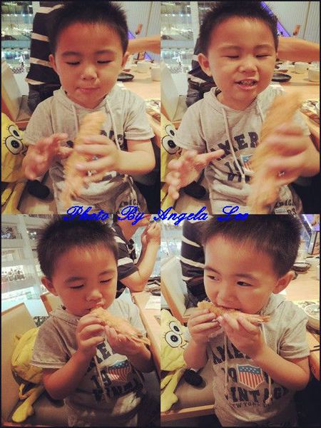 享用炸蝦的齊齊