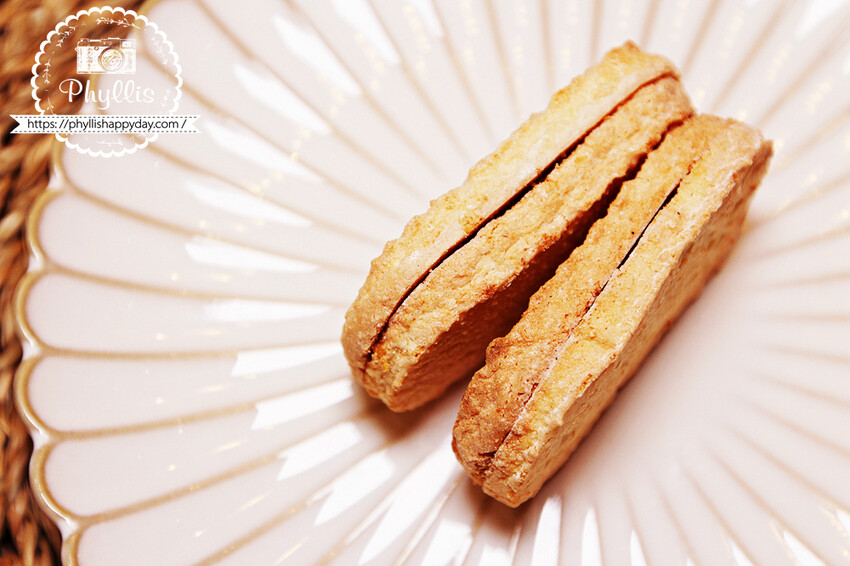 『法布甜』馬卡龍鳳梨酥|米其林指定伴手禮|台中人氣甜點推薦|超夯2024新年禮盒首選! - 相片中的菲莉絲