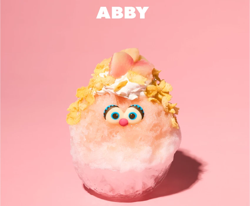 ▲水蜜桃及濃郁的乳酪醬的「艾比」刨冰。